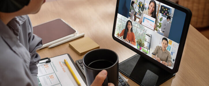 asian woman video conference business meeting with colleague online with tablet at home