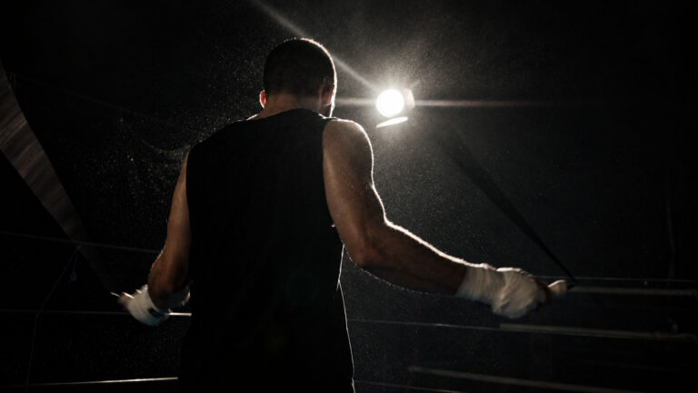 A boxer training with a jump rope
