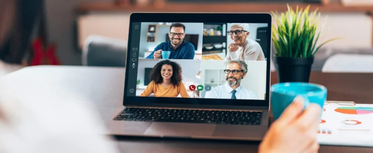 Business team telecommuting in a video conference.