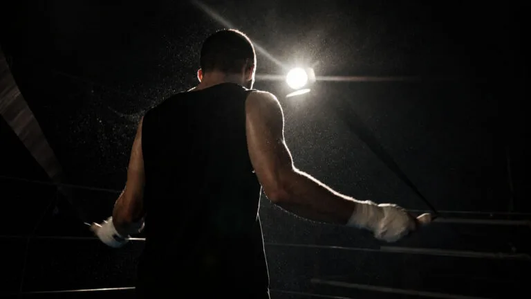 A boxer training with a jump rope